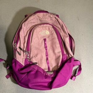 Pink and purple The North Face backpack